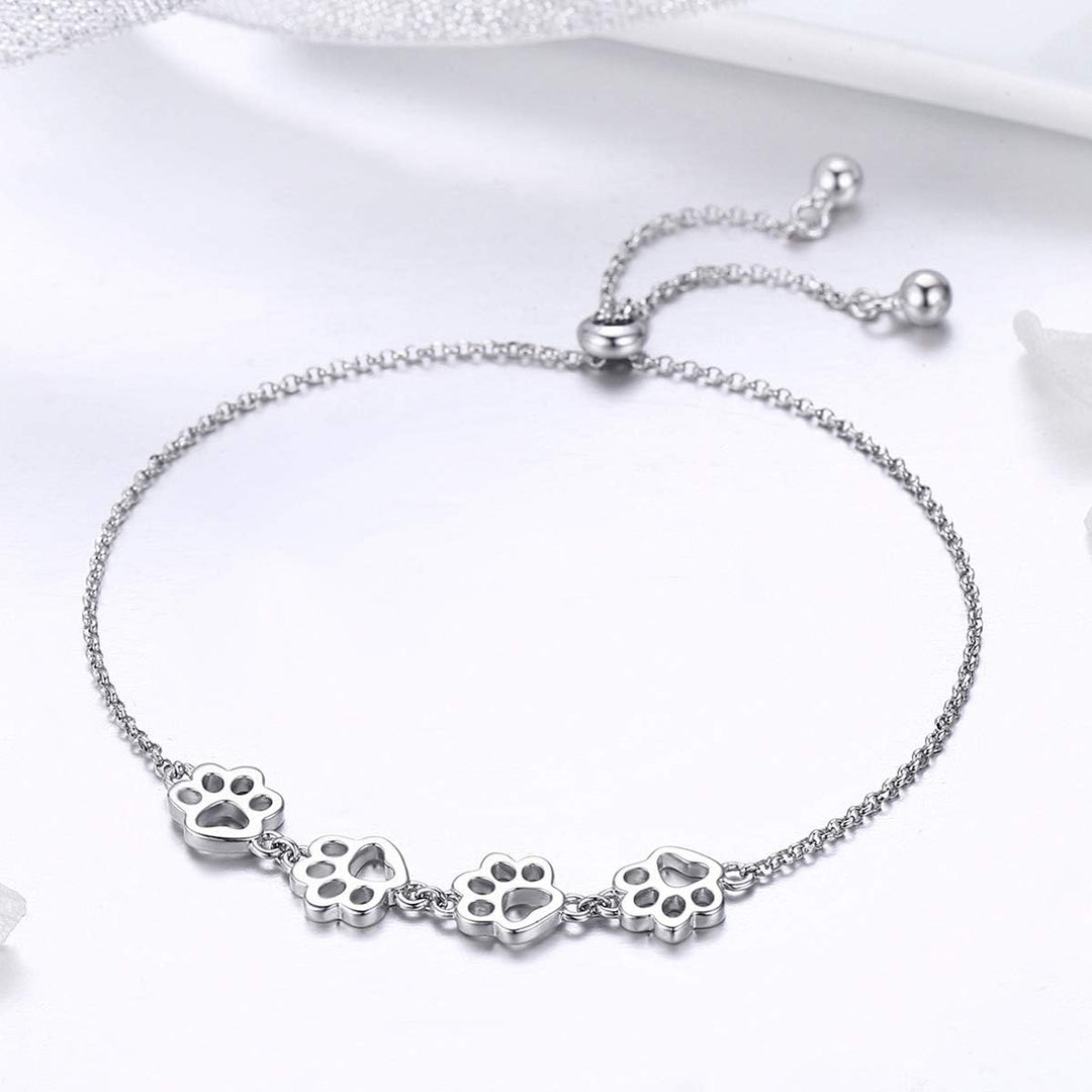 Pulsera de plata ajustable con diseño de huella de perro