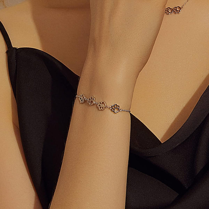 Pulsera de plata ajustable con diseño de huella de perro