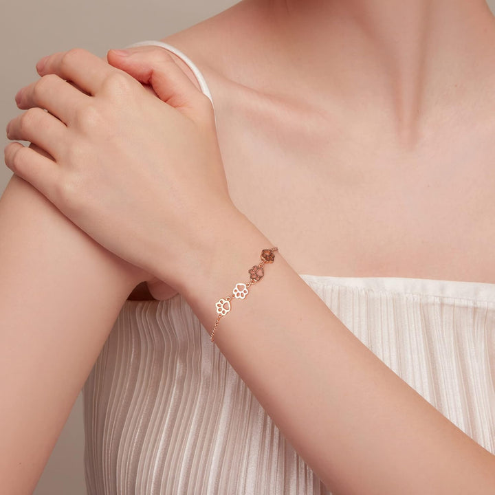 Pulsera de plata ajustable con diseño de huella de perro