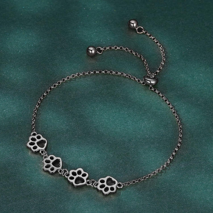 Pulsera de plata ajustable con diseño de huella de perro