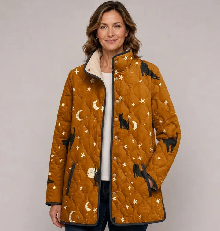 Tuija | Chaqueta acolchada mostaza con estampado de gatos