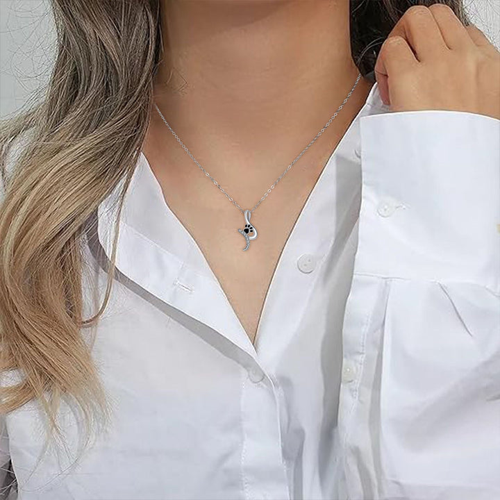 Collar con colgante de pata de perro 'Leal Compañero'